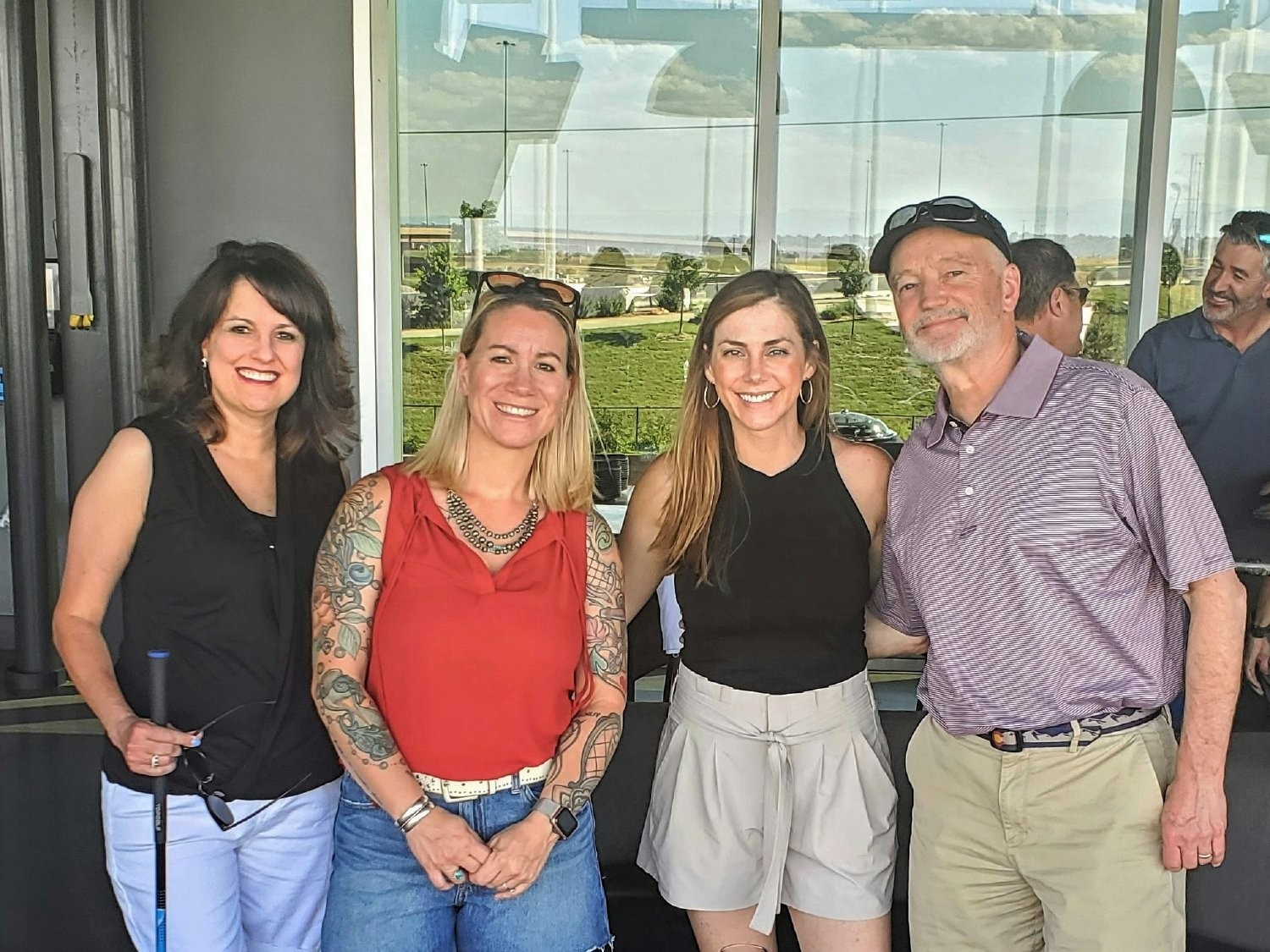 Enjoying our summer social at Top Golf!