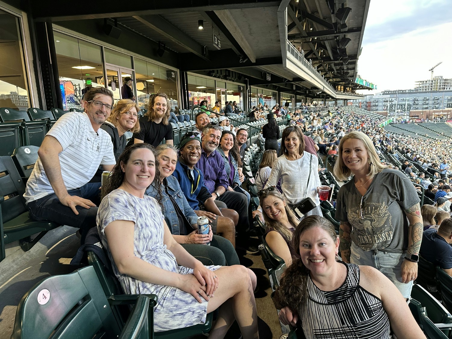 We often enjoy team happy hours followed by a Colorado Rockies game. Extra big smiles for a Rockies win!