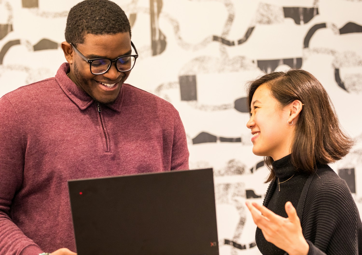 Kristin, Merit America colleague, and Alumni learner, Halid, collaborating at our Employee Onsite