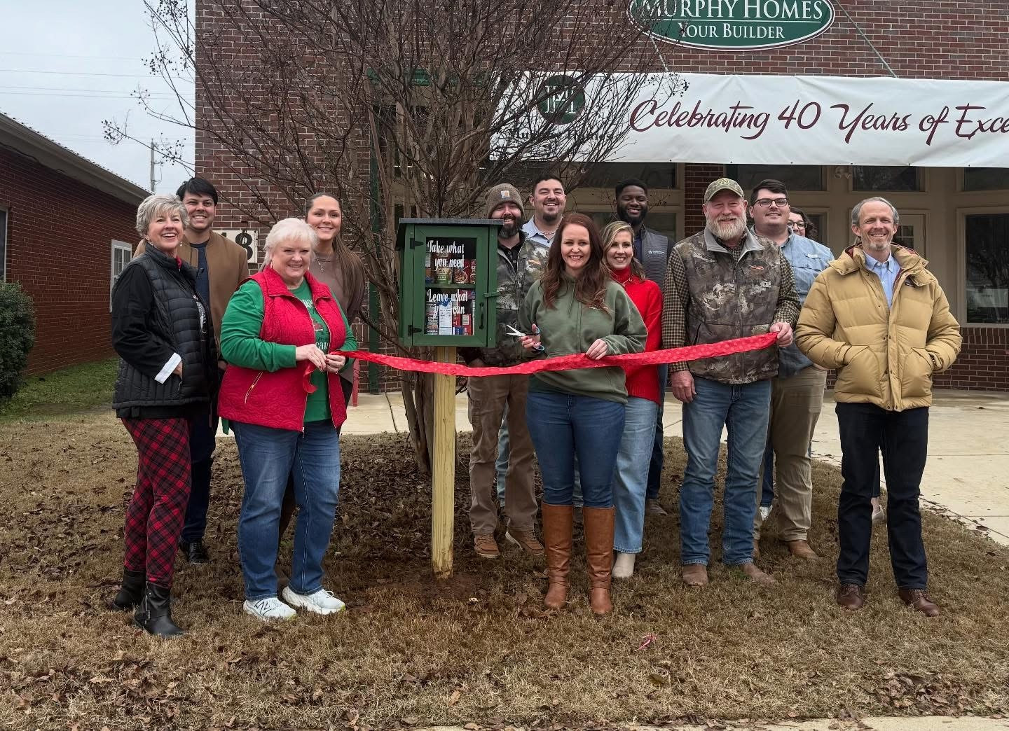 Opening a little free food pantry at the Murphy Homes office! 