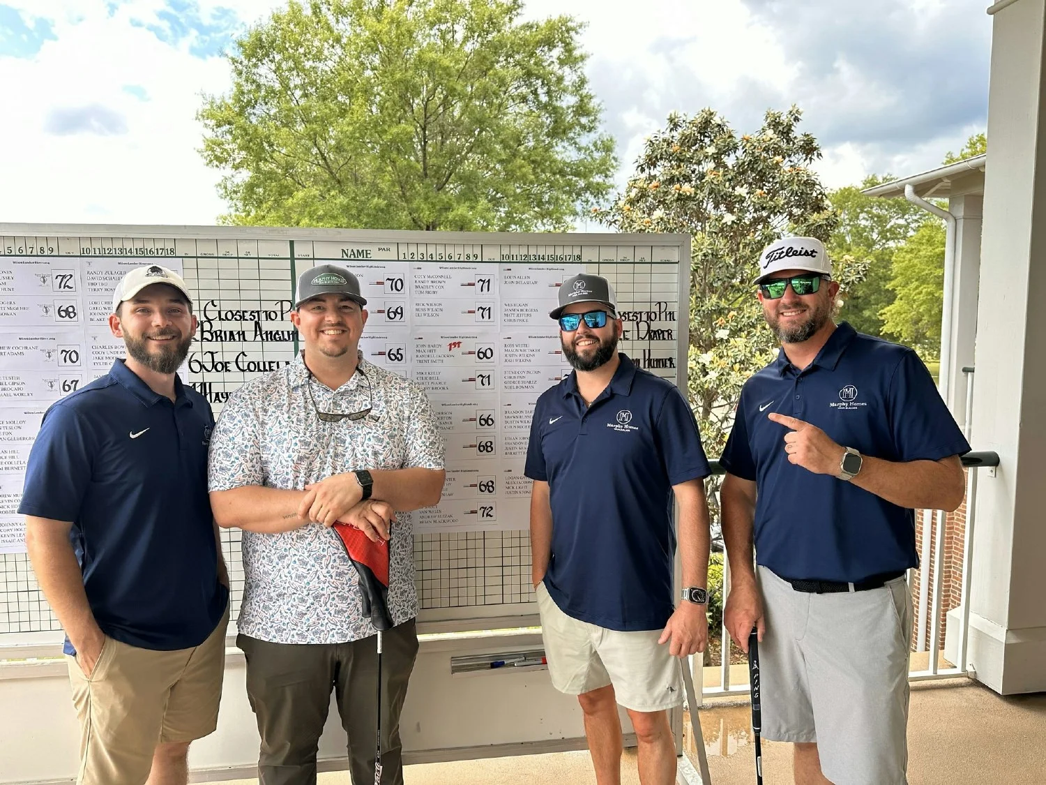 A few members of our construction team participating in a charity golf tournament. 