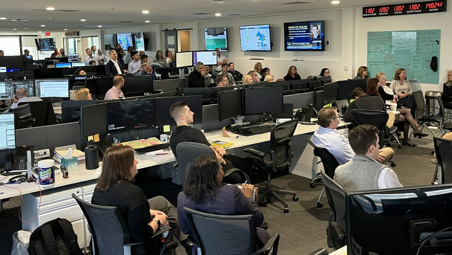 Employees attend a companywide Townhall, held on the East Coast Trade Floor and broadcast virtually.