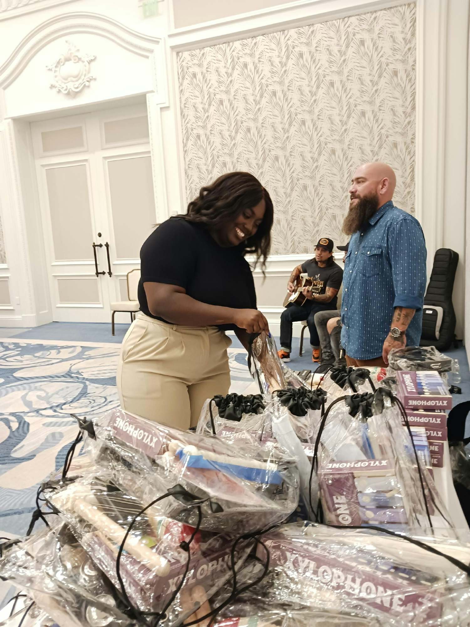 Our team member assembling music instrument kits for a local charity in our South Florida market.