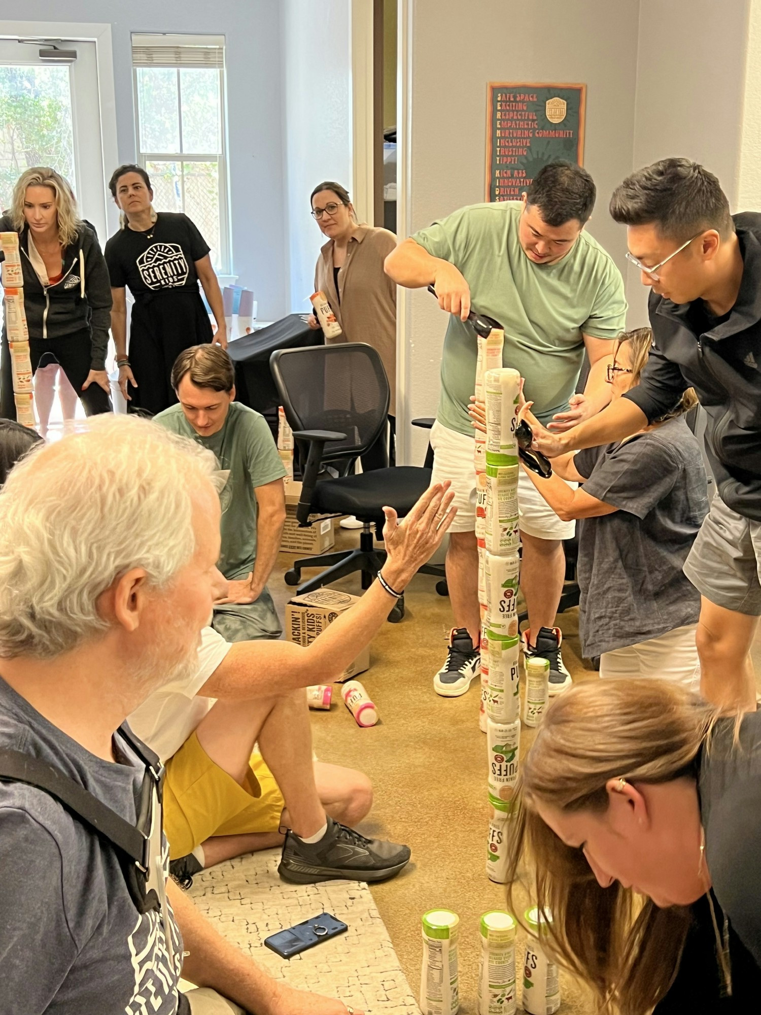 Puff stacking team building because nothing brings people together like snacks, strategy, and a little creative chaos!