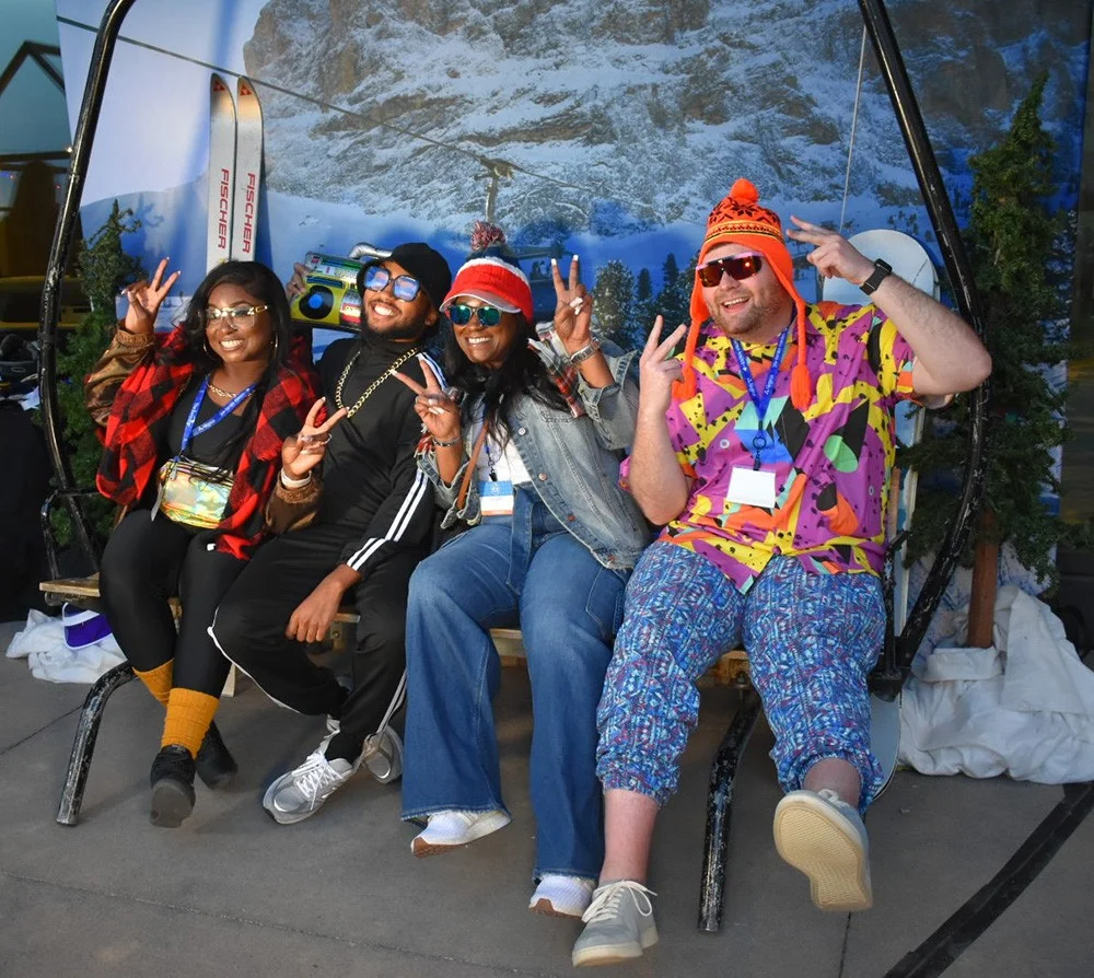 Members of Team Alegeus enjoying some laughs together during a special “Apres Ski” theme party. 