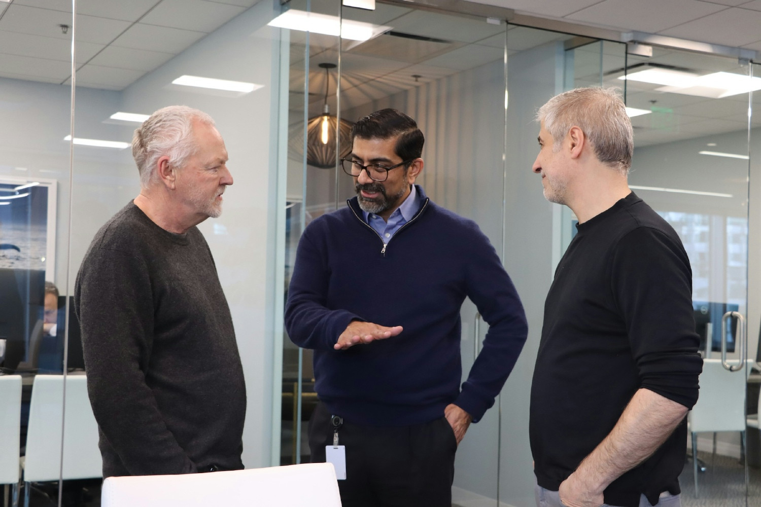 Three technology leaders brainstorming