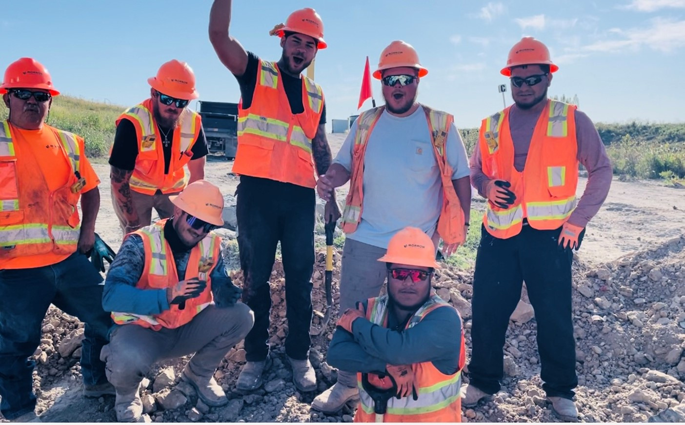 On the road again...Our Traveling Construction Team take time out to smile for the camera.