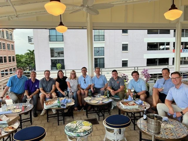 The team enjoyed a rooftop Happy Hour sharing food, drinks and great comaraderie.