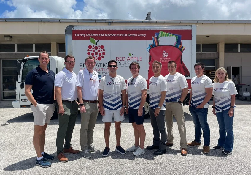 We volunteered at the Education Foundation of Palm Beach County packing backpacks for our back to school project.