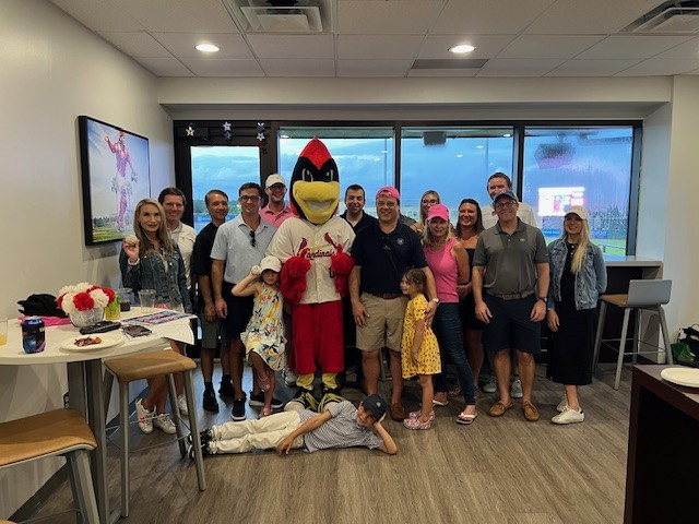 Our Summer Social at the ballpark included a surprise visit from Robbie the Redbird after Ben threw out the first pitch.