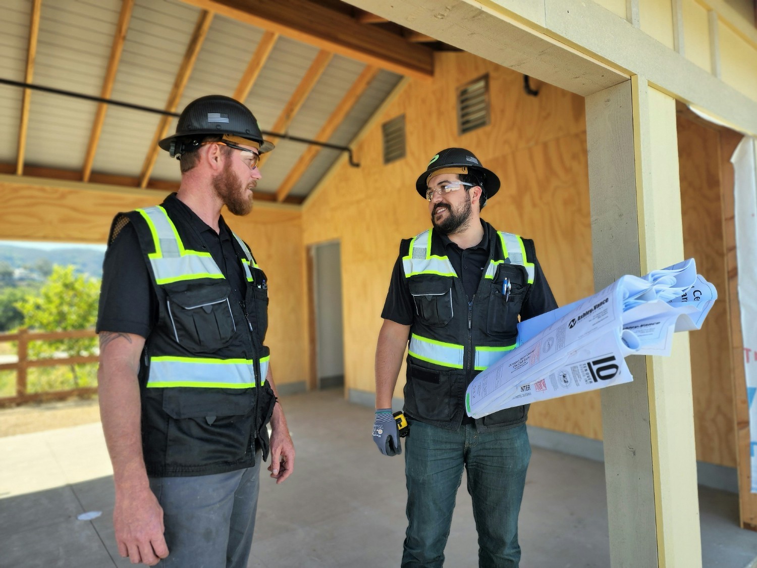 Precision superintendent Scott Grunow, left, and project manager Trent Mendonca on the job in San Luis Obispo, CA.