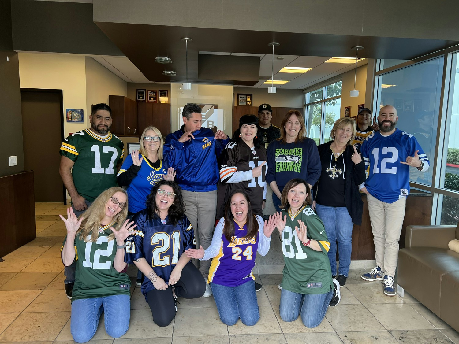 The office sports their Sporting colors to celebrate Football season.
