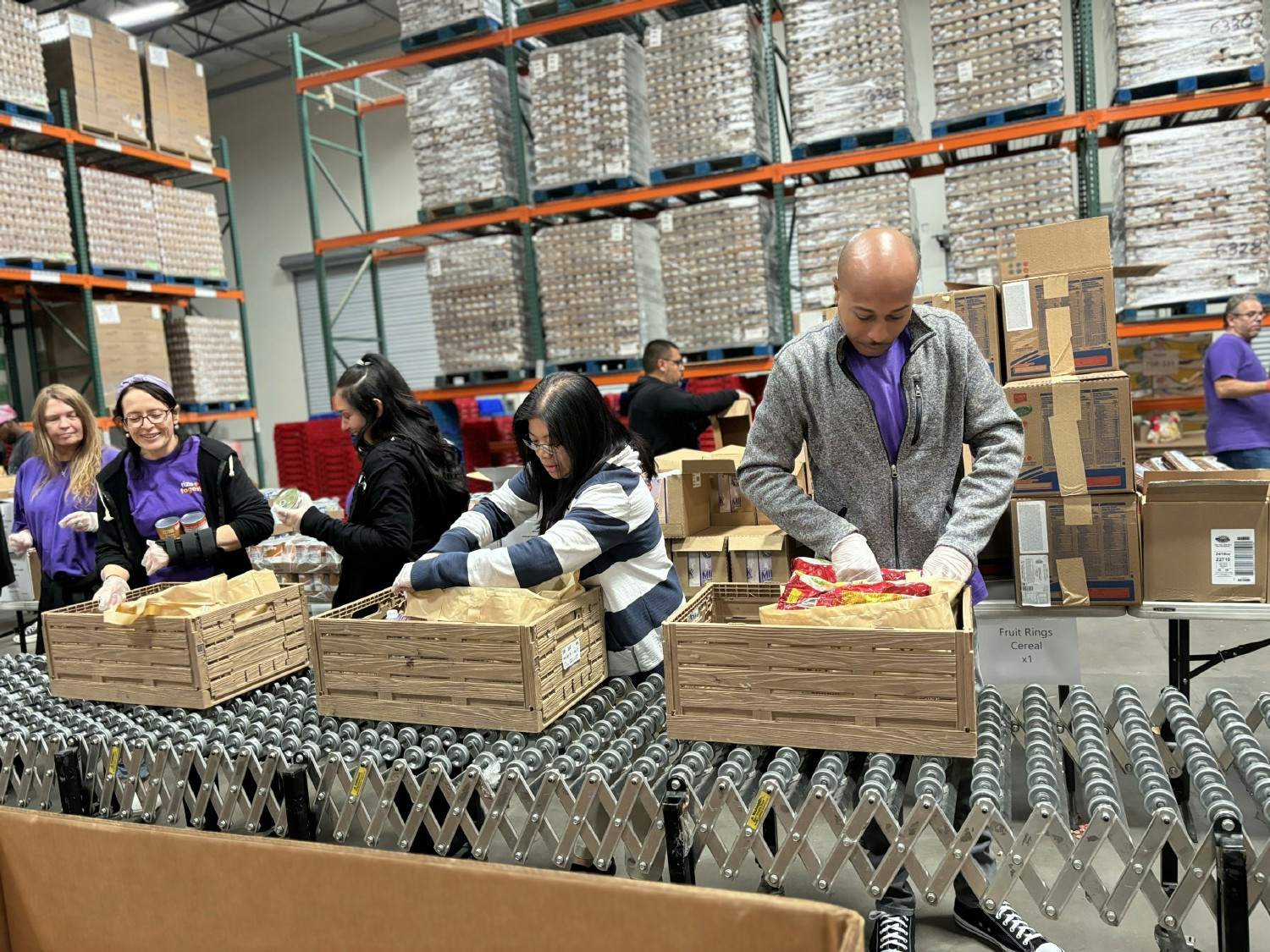 Team members in Nevada volunteering at a food donation event.