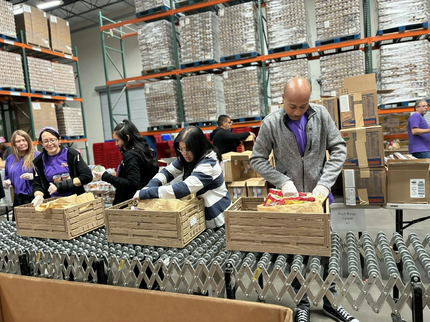 Team members in Nevada volunteering at a food donation event.