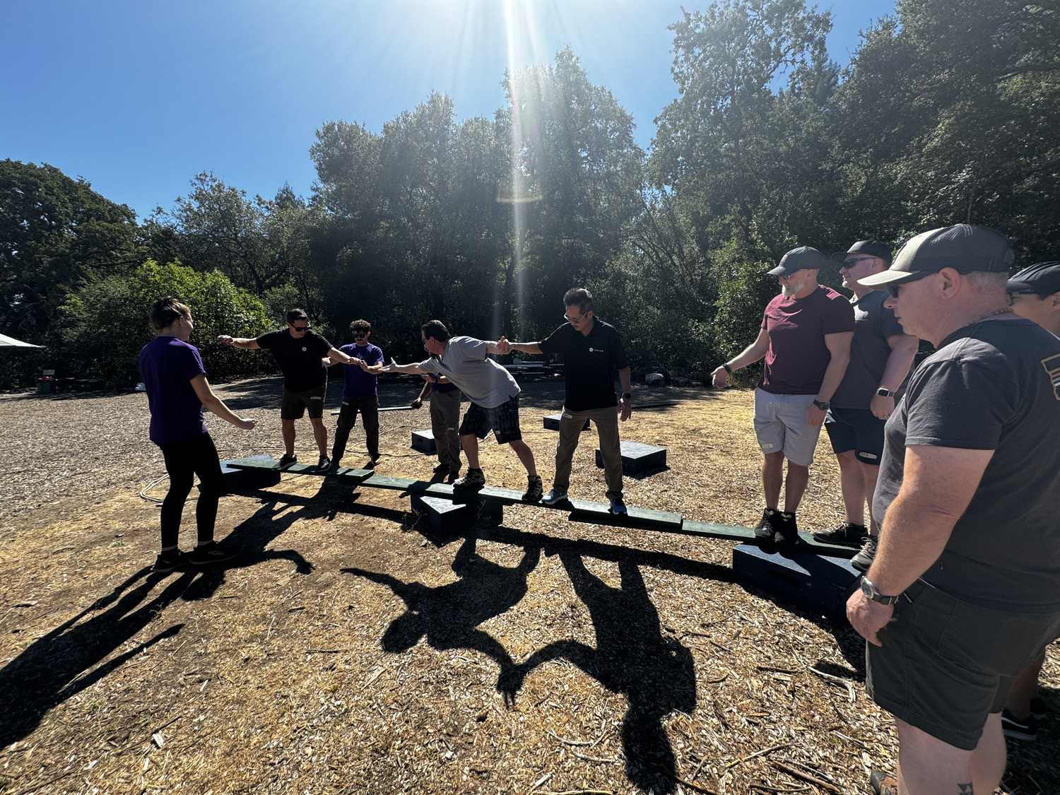 Staff members participating in a team-building activity in Sonoma.