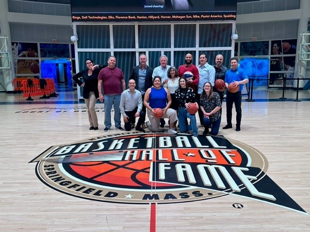 We enjoy having fun company events such as gathering together to shoot some hoops at the Basketball Hall of Fame.