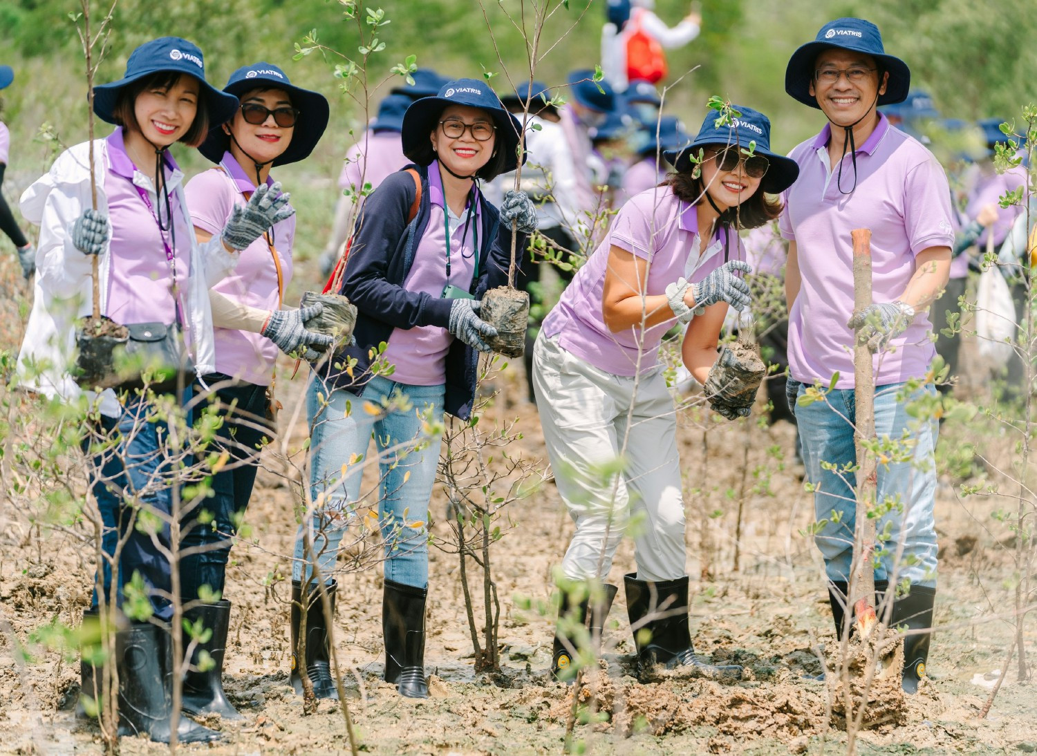 Building Healthier Communities: Colleagues volunteering in local activities to help strengthen communities.