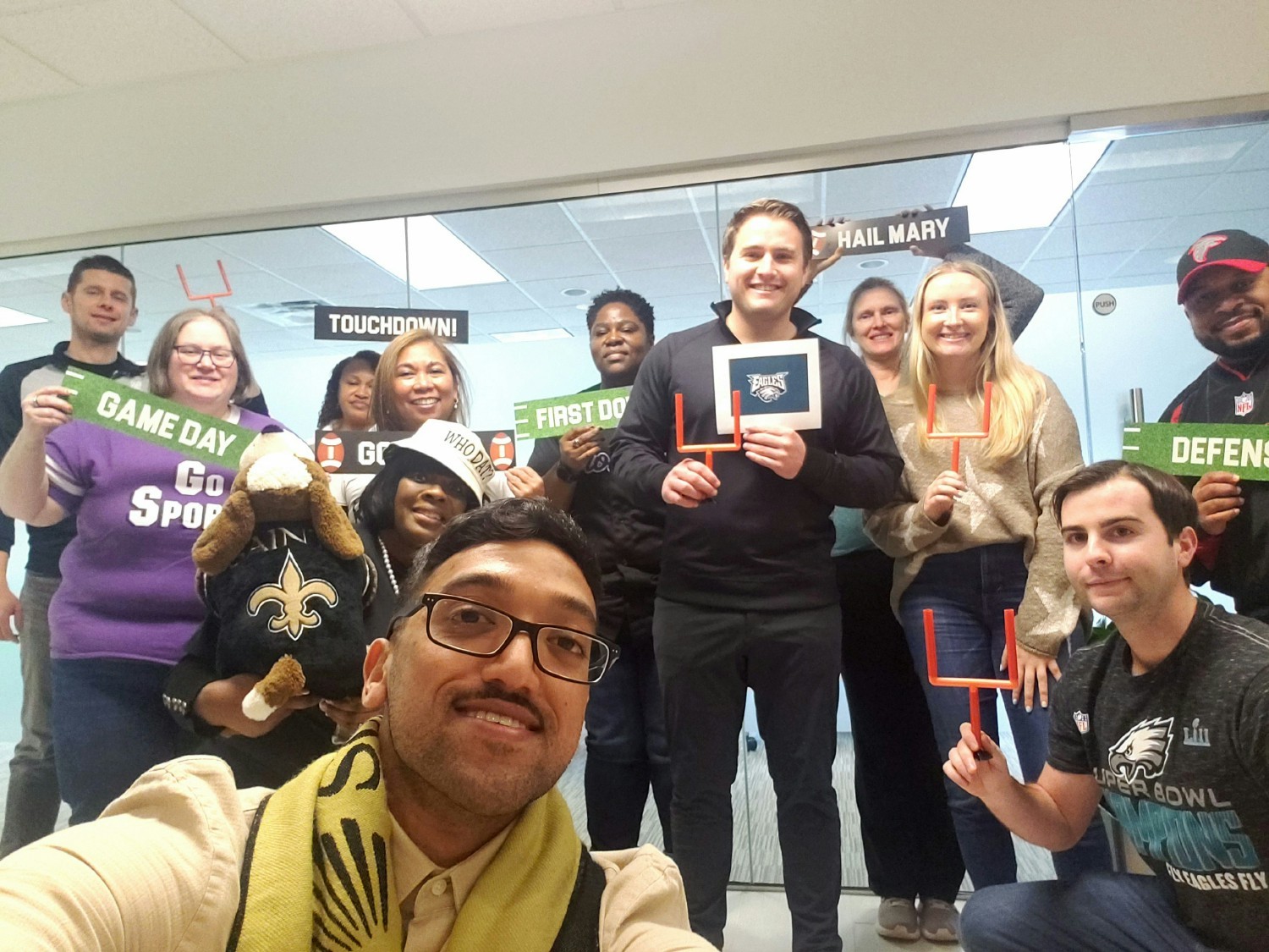 Admiral's Atlanta office celebrated the Superbowl, showing off their favorite teams' gear