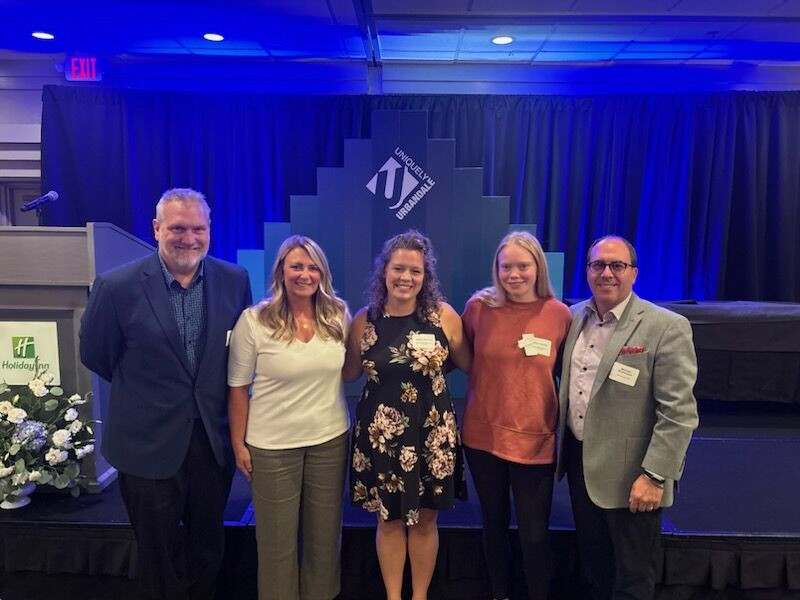 Urbandale OneroRx location winning an award at their local chamber of commerce awards.