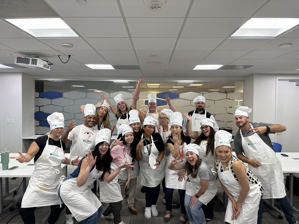 Our employees love a good team-building activity, and this cooking class hit the mark for our Marketing / Comm Ed teams!