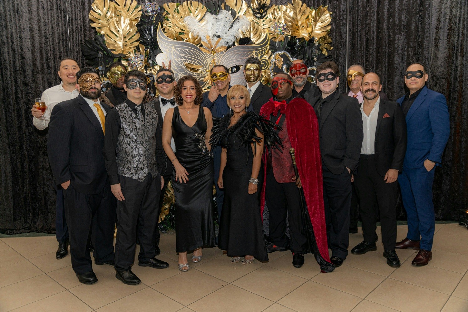 BioTissue employees celebrate a successful 2023 together at our masquerade-themed Holiday Party!