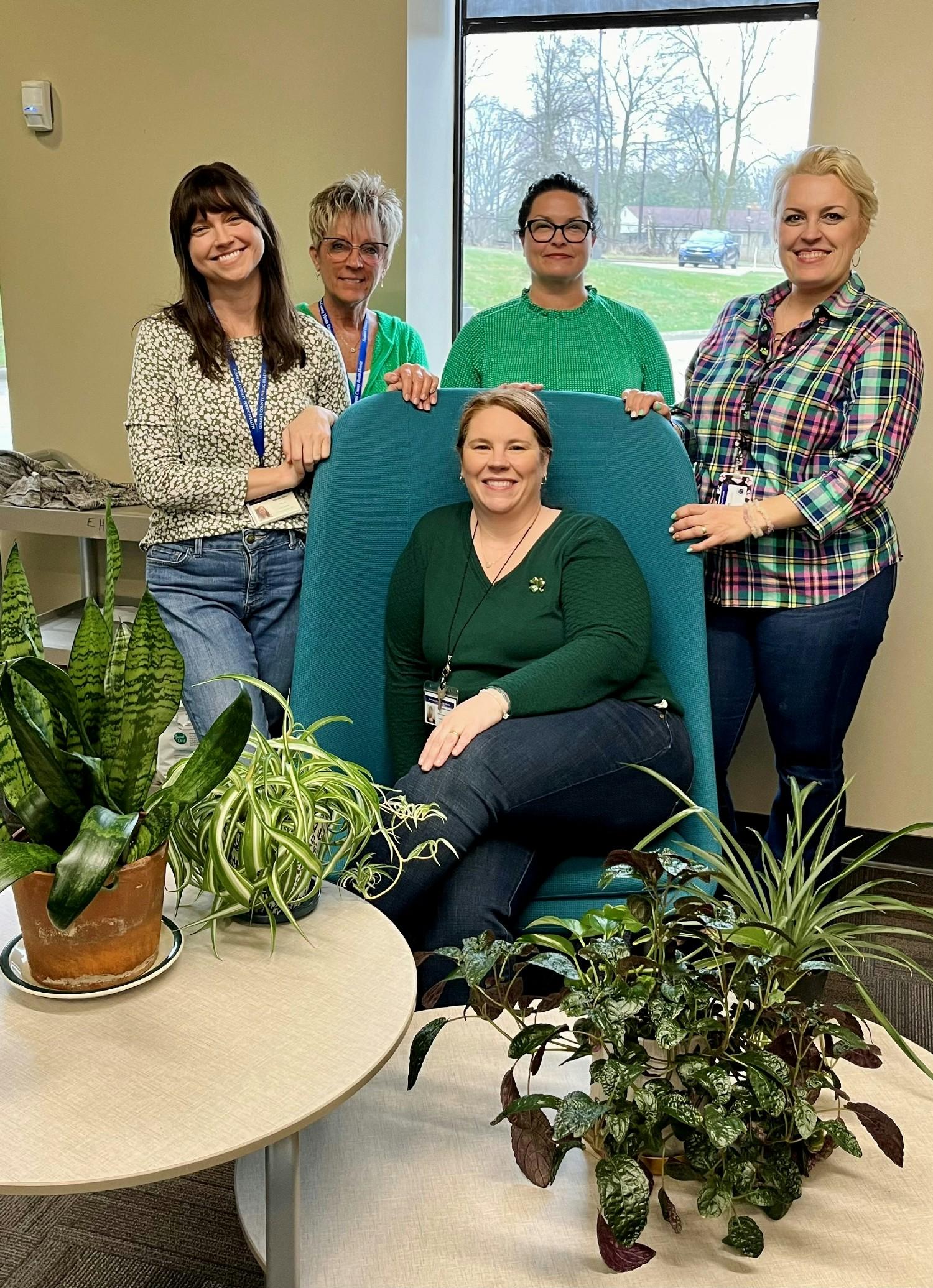 SCPH's Environmental Health Division wear green to support child support awareness month.
