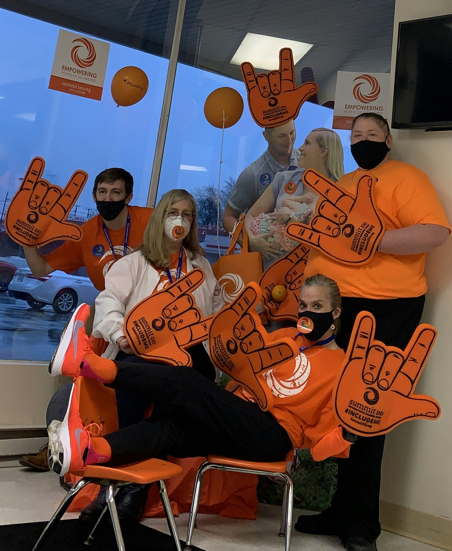 SCPH staff wearing orange to support inclusion day. 
