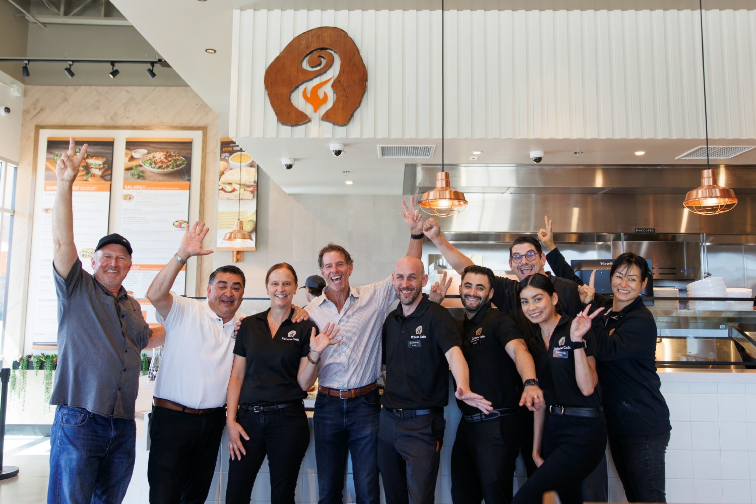 Get fired up! CEO Tom at a new restaurant opening
