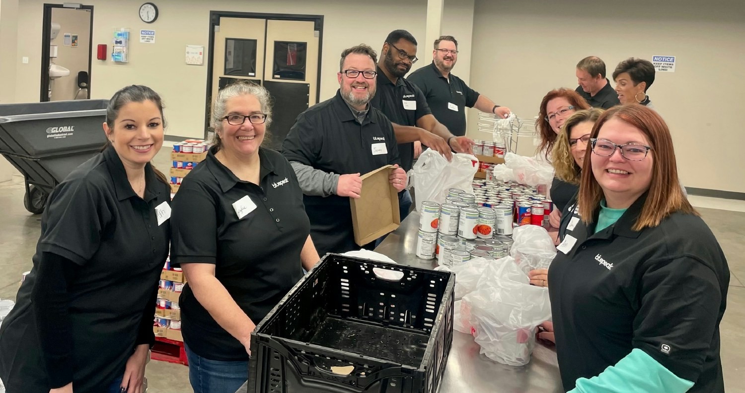 Bluepeakers work the assembly line at Bluepeak’s Feeding South Dakota in Sioux Falls on Jan. 12, 2023. 