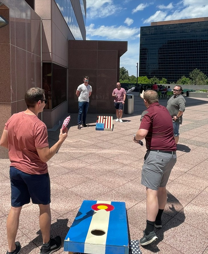 Bluepeak employees brought the heat at our summer BBQ cornhole showdown!