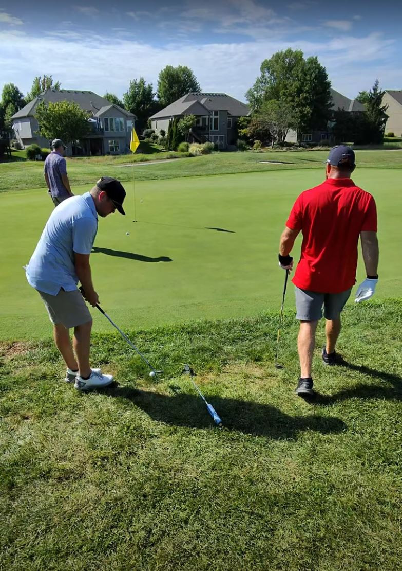 Participating at a charity golf tournament in Kansas City.