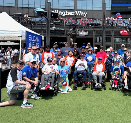 Sloan employees participate in the company’s annual ALS Day in partnership with the Chicago Cubs.