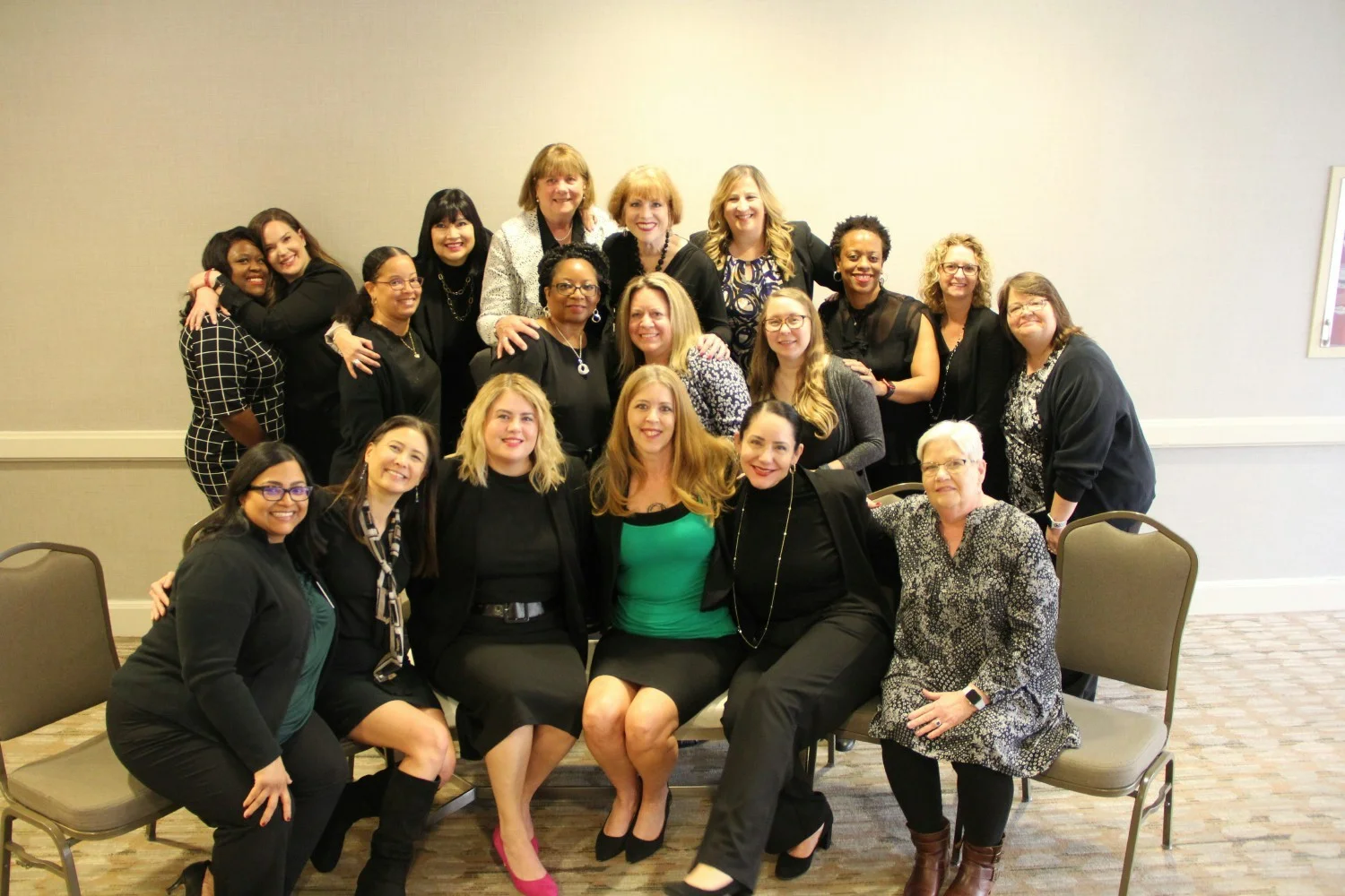 Women leadership at corporate headquarters celebrating National Women's Day in Dallas, TX.