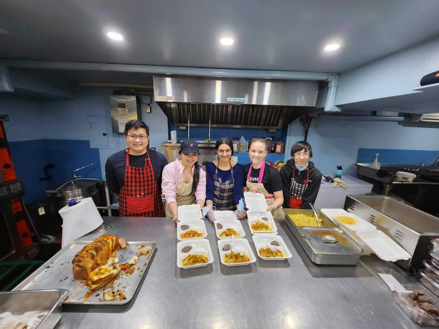 Some team members volunteering at a nearby shelter!