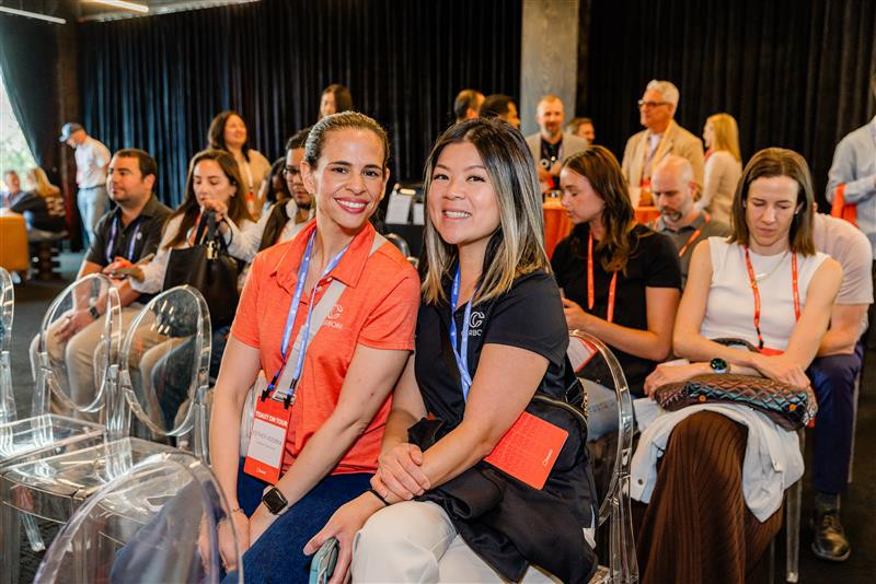 Twho of our marketing employees in an event hosted by TOAST.