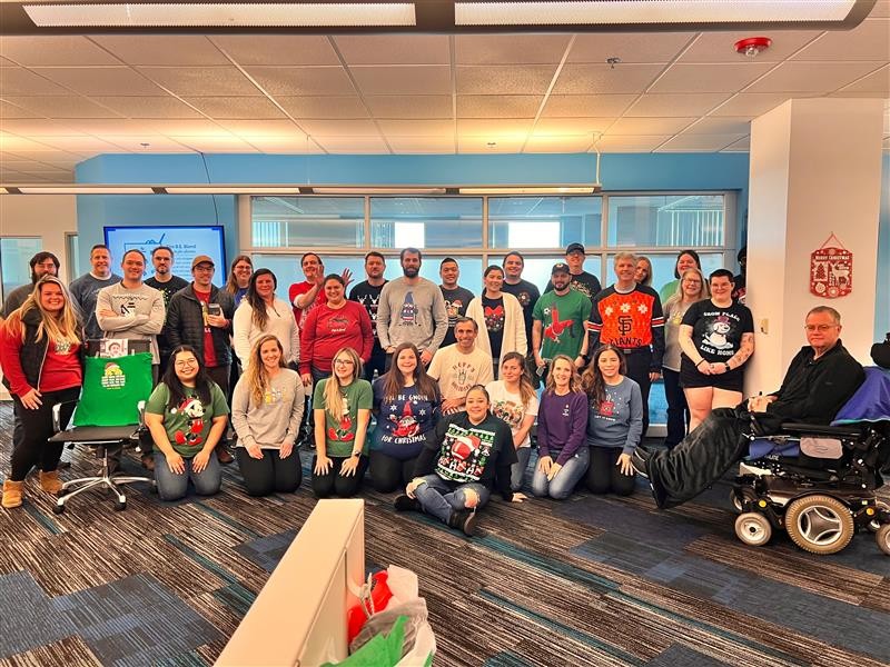 Group photo with holiday shirts