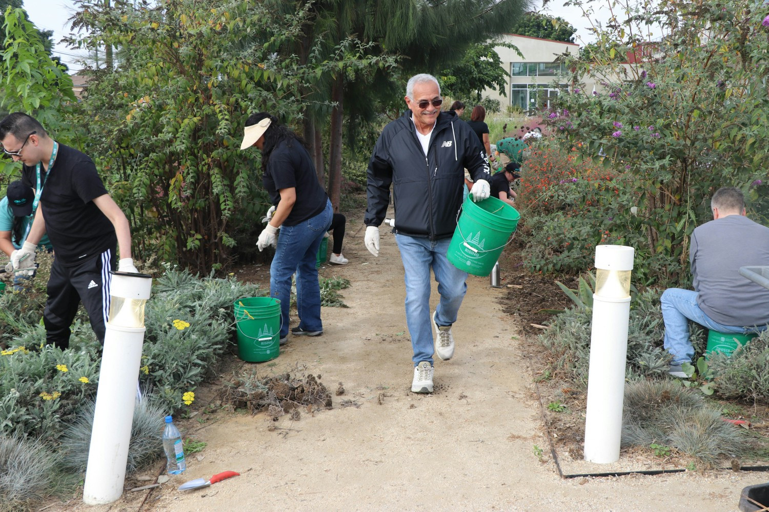 CPA team members volunteering a local community farm. #PowerforGood