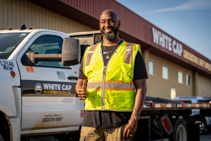 Champions of the Road—our White Cap driver delivering safety, pride, and excellence every mile.