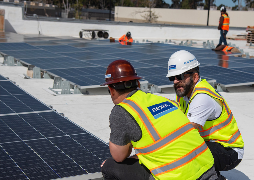 On-site inspection during solar panel installation. 
