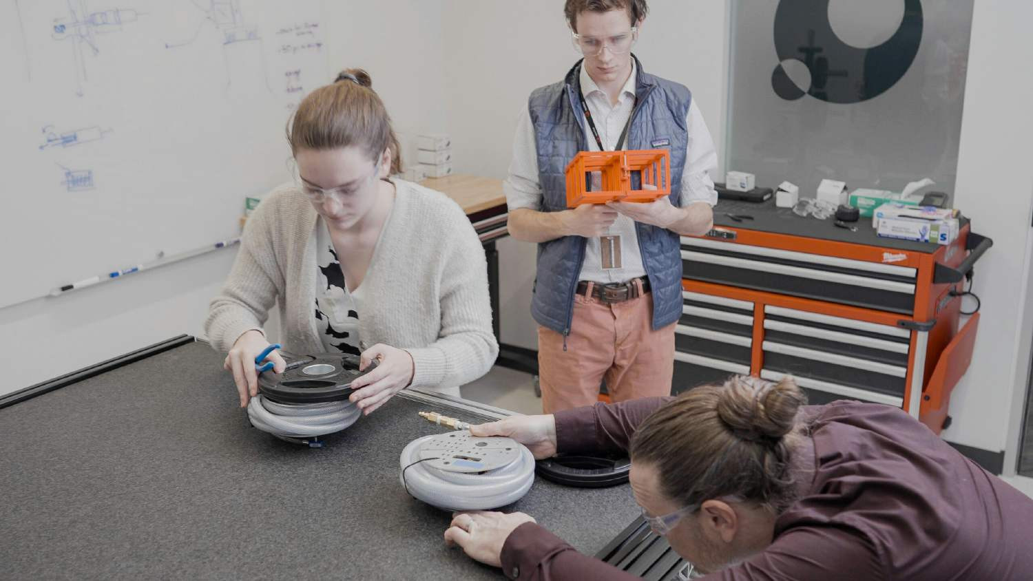 Quartusonians hard at work in our Sterling office lab space. 