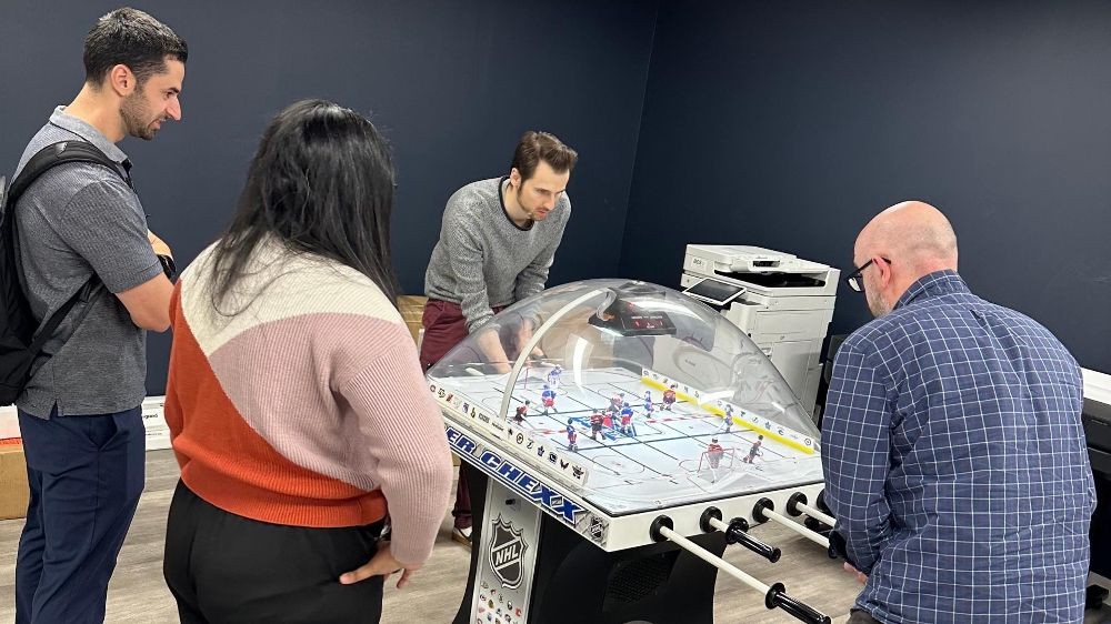 Bubble Hockey Competition in our Armonk, NY office.