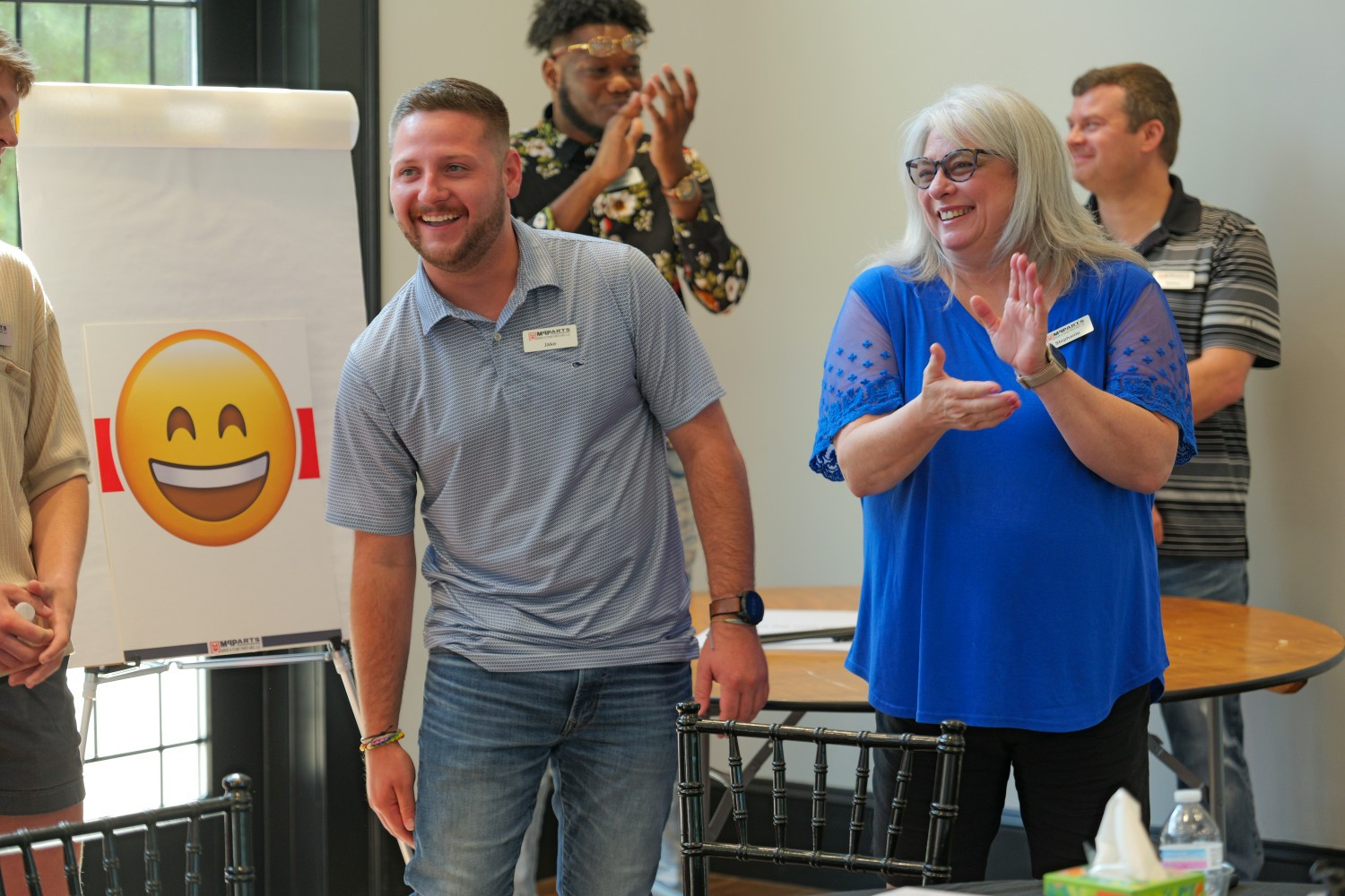 Our team members spreading positivity during a breakout session.