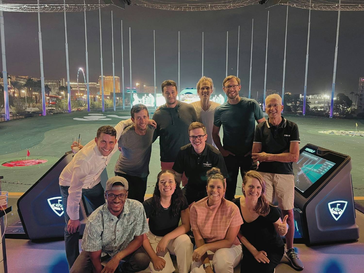 Members of our various teams, including our SVP, Operations and Chief Legal Officer, playing at Top Golf!