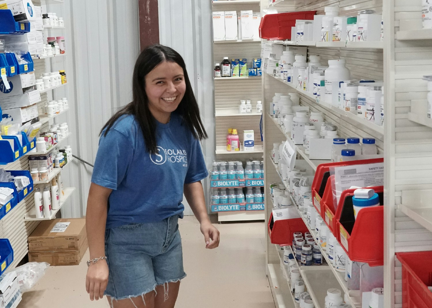 One of our pharmacy techs having a good laugh while ensuring our patients get the medications they need.
