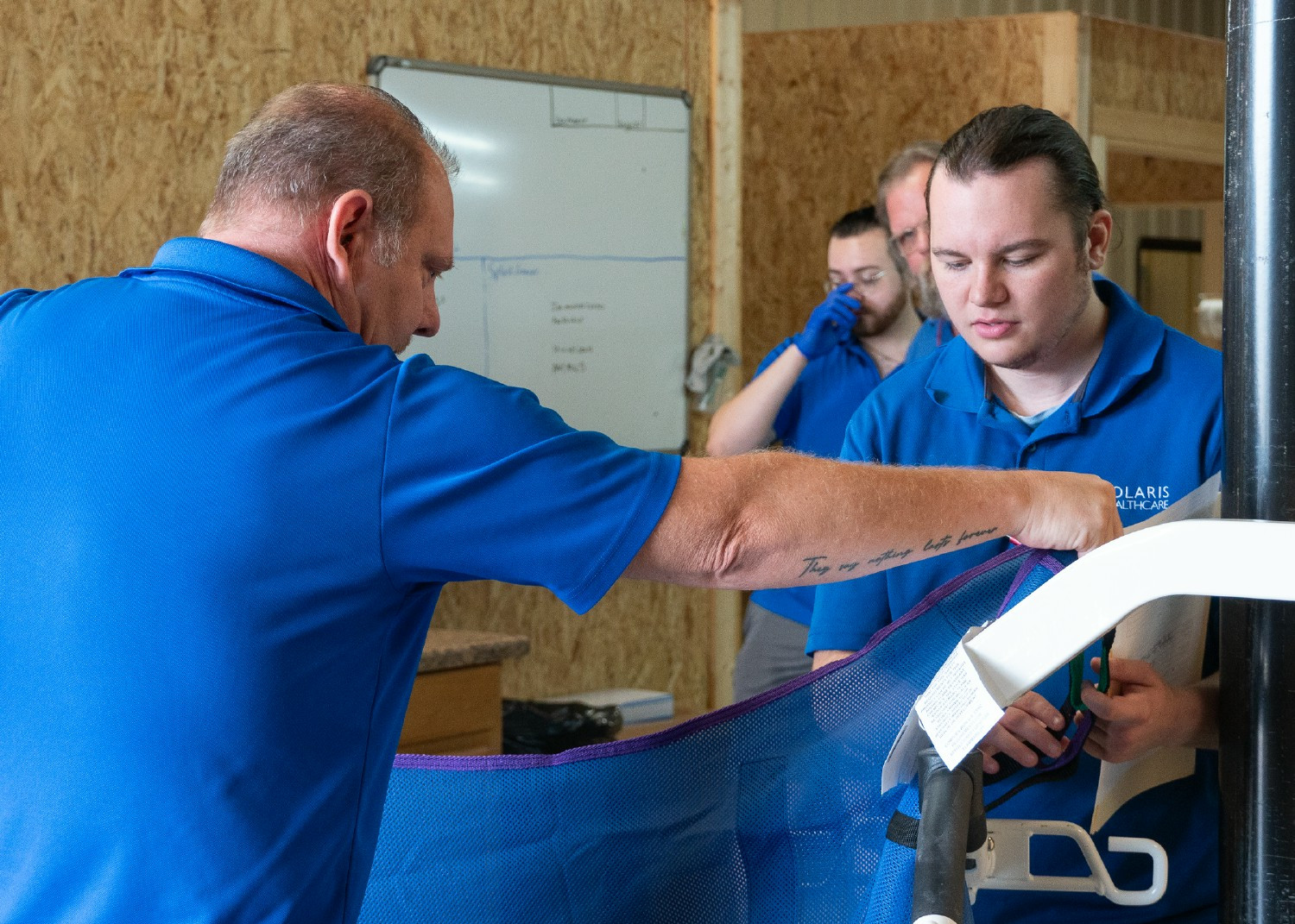 Our DME Director is training staff on the proper use of durable medical equipment to ensure patient safety.
