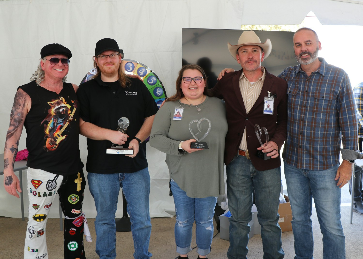 VP Neil Livingston (left) and CEO Andy Milligan (right) with some of our annual award winners.