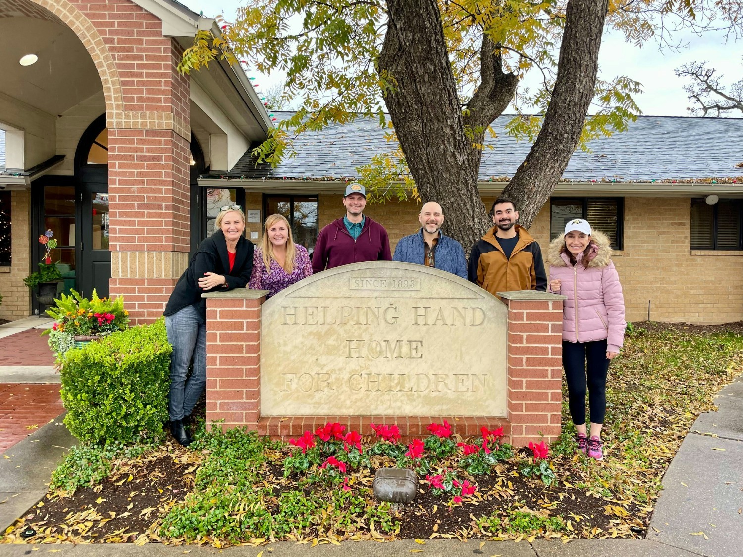 Team members volunteering at a local charity in Austin, TX