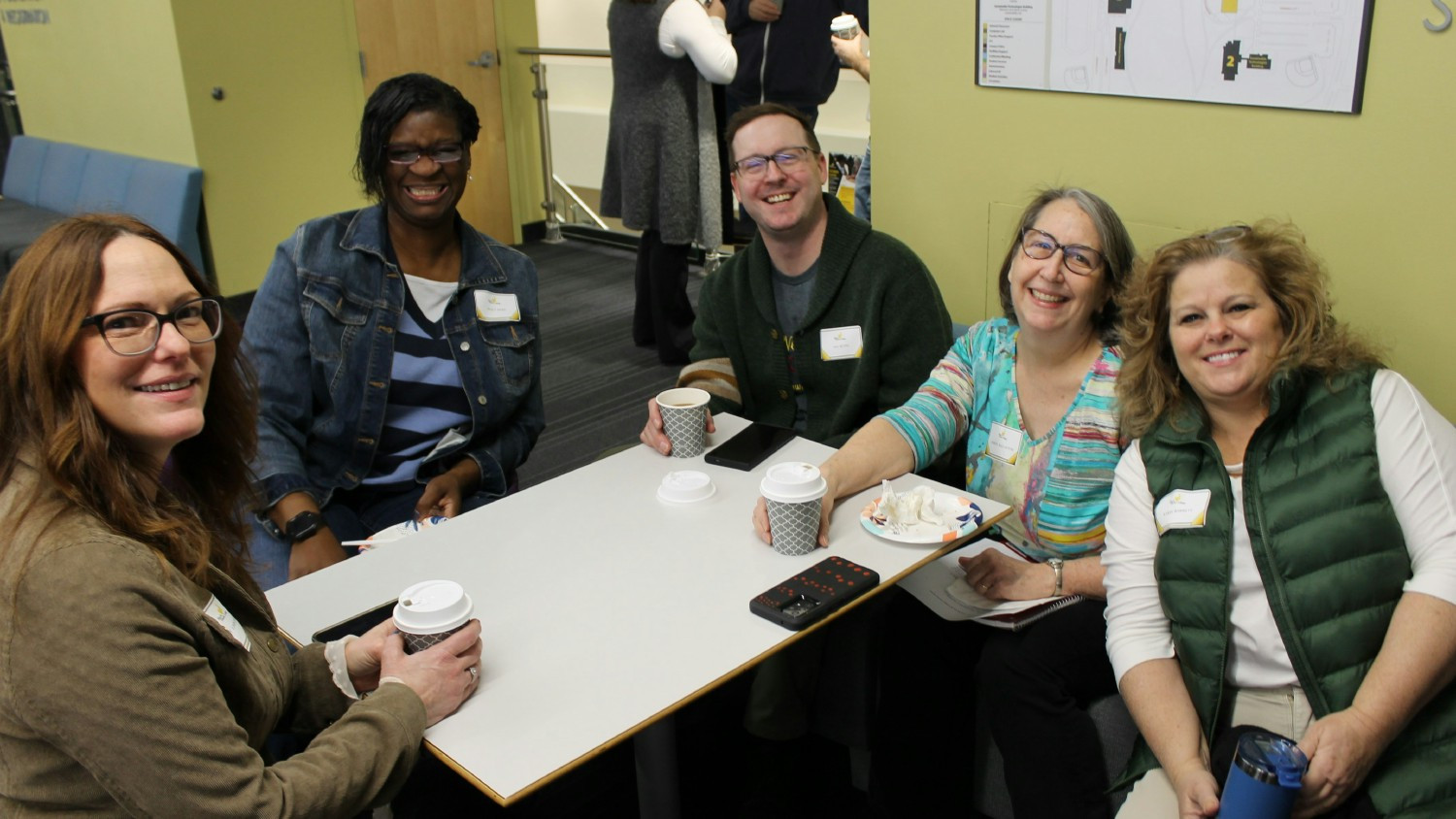 Faculty members gather at Assembly Day to learn about new programs, resources and opportunities and enjoy time together.