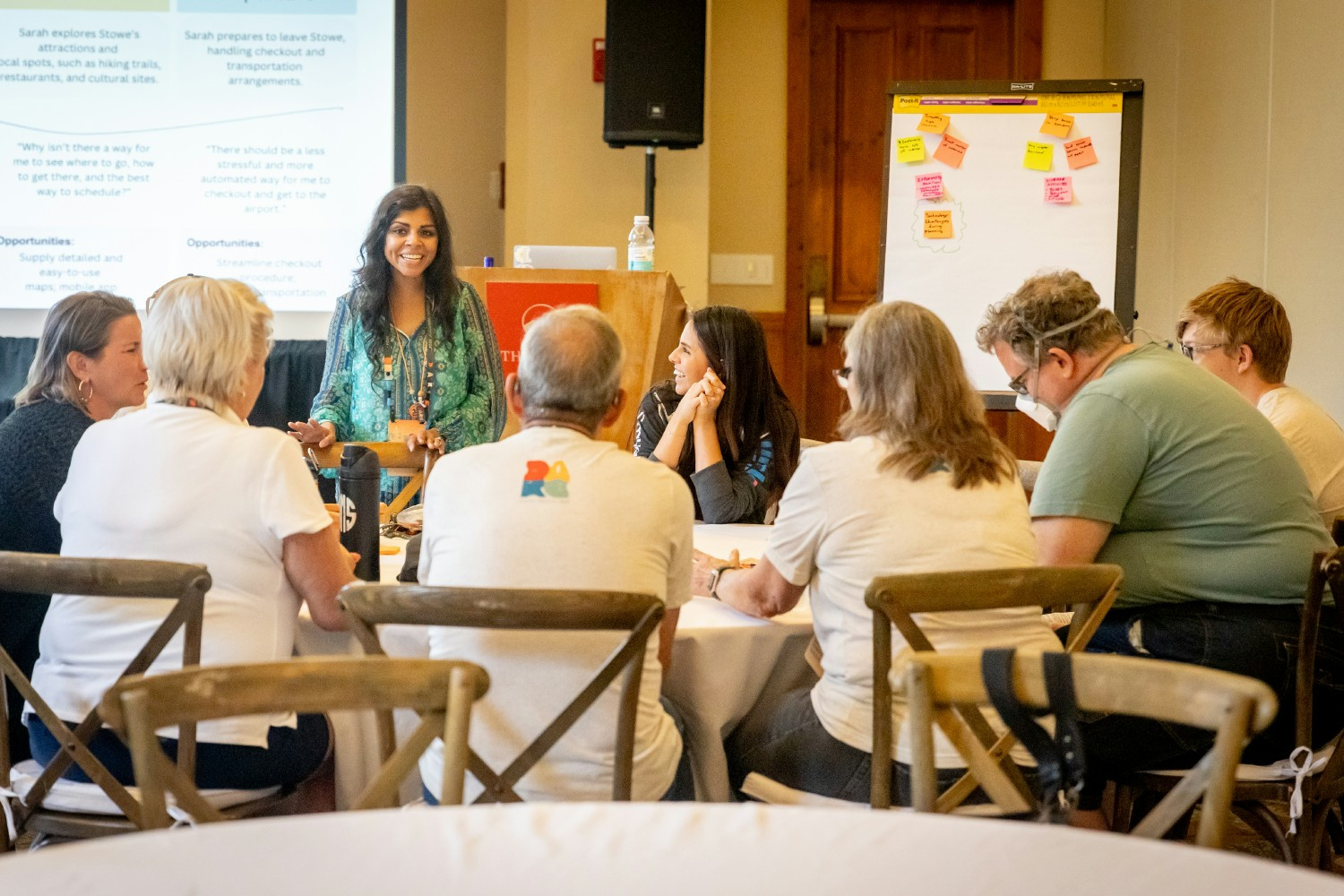 Our CEO and COO presenting at our annual company retreat, where families are included in everything.