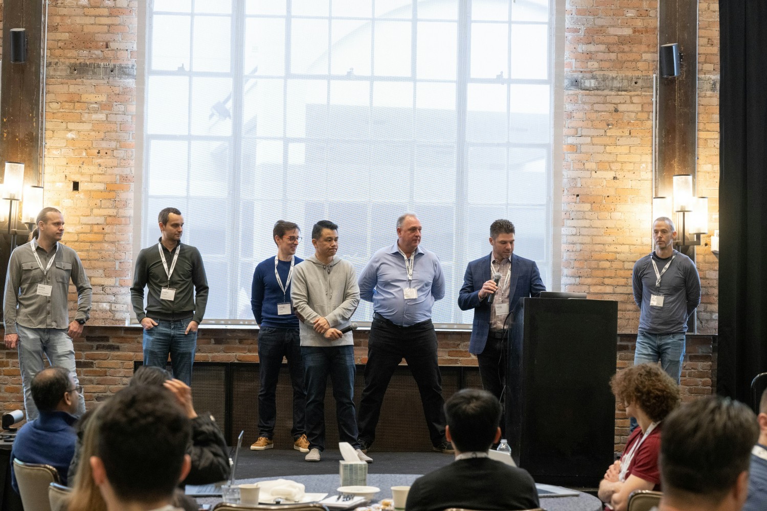 Executives addressing the company at offsite